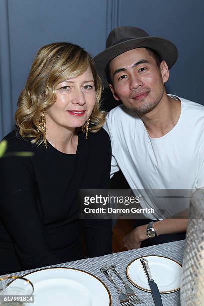 Sarah Mower and Han Chong attend the Self-Portrait Dinner at The National Portrait Gallery on October 25, 2016 in London, England.