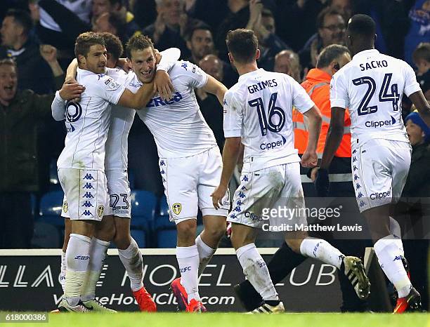 Chris Wood of Leeds United celebrates with team mates after scoring his sides second goal during the EFL Cup fourth round match between Leeds United...