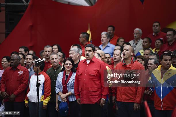 Nicolas Maduro, Venezuela's president, center, his wife Cilia Flores, third left, and Hector Rodriguez, deptuy of Venezuela's National Assembly,...