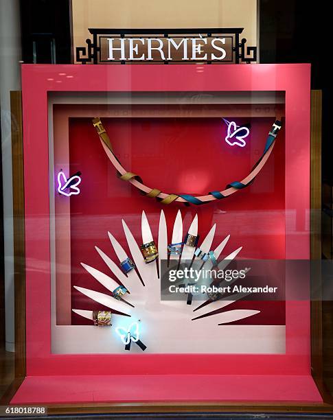 August 31, 2016: A window display features a Hermes fashion accessories display at the Brown Thomas luxury goods store on Grafton Street in Dublin,...