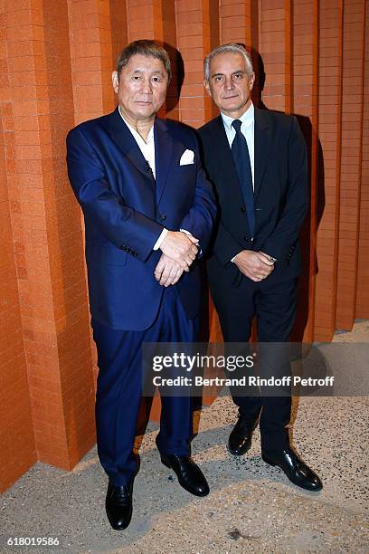 Japenese Artist Takeshi Kitano and General Director of the Cartier Foundation, Herve Chandes attend the Japenese Artist Takeshi Kitano receives the...