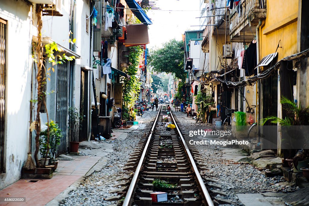 Life of people who live near the railway in Hanoi ancient town.