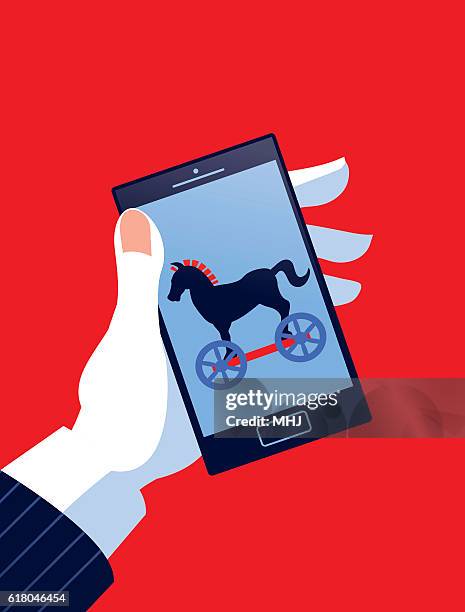 businessman holding mobile phone with trojan horse - trojan horse 幅插畫檔、美工圖案、卡通及圖標