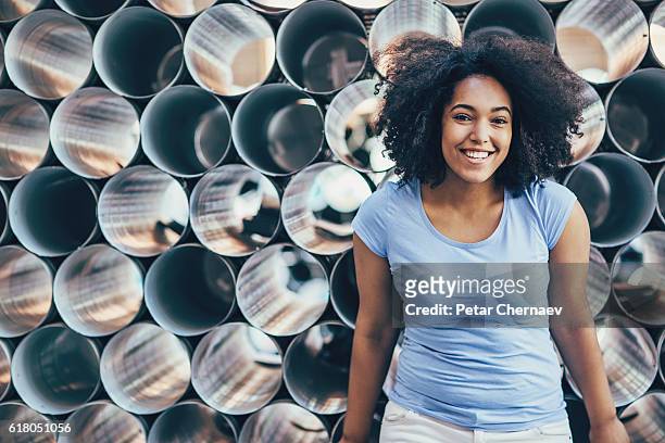smiling african ethnicity girl - creole ethnicity stockfoto's en -beelden
