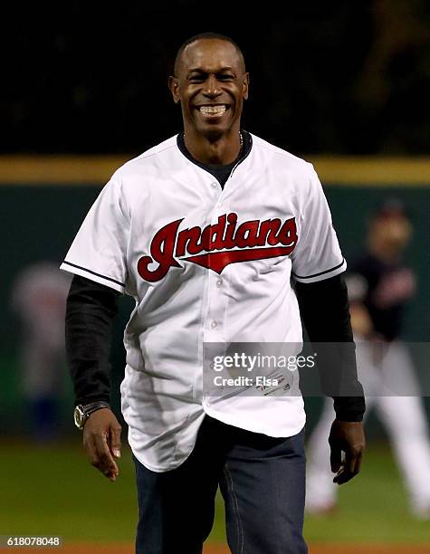 Former Cleveland Indians outfielder Kenny Lofton throws out the first pitch prior to Game One of the 2016 World Series against the Chicago Cubs at...