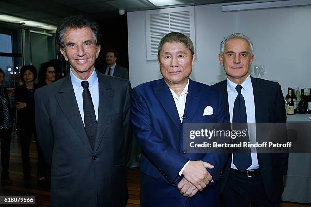 Jack lang, Artist Takeshi Kitan and General Director of the Cartier Foundation, Herve Chandes attend Takeshi Kitano receives the French Legion of...