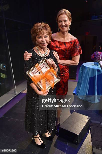 Author Isabel Allende poses on stage with award and Nancy Northup at The Center for Reproductive Rights 2016 Gala at the Jazz at Lincoln Center on...