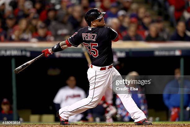 Roberto Perez of the Cleveland Indians hits a solo home run during the fourth inning against the Chicago Cubs in Game One of the 2016 World Series at...