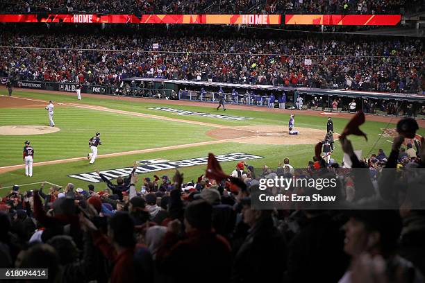 Roberto Perez of the Cleveland Indians runs the bases after hitting a solo home run during the fourth inning against the Chicago Cubs in Game One of...