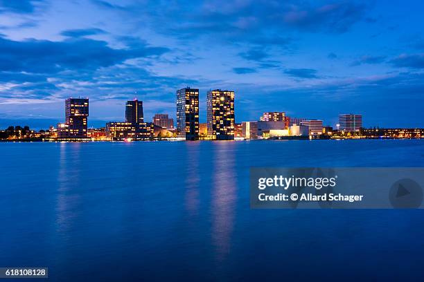 skyline of almere netherlands at dusk - flevoland stock pictures, royalty-free photos & images