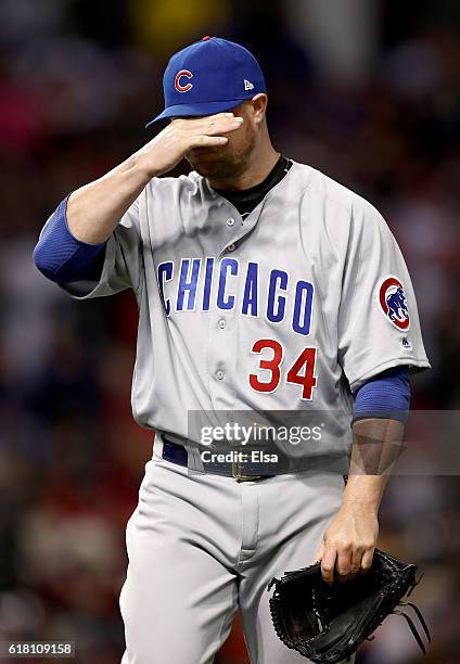 Jon Lester of the Chicago Cubs reacts after being relieved during the sixth inning in Game One of the 2016 World Series against the Cleveland Indians...