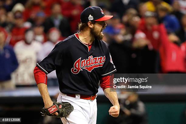 Andrew Miller of the Cleveland Indians reacts after striking out Kyle Schwarber of the Chicago Cubs , to end the top of the eighth inning in Game One...