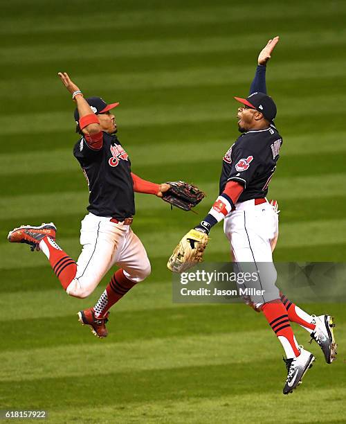 Francisco Lindor of the Cleveland Indians celebrates with Rajai Davis after defeating the Chicago Cubs 6-0 in Game One of the 2016 World Series at...