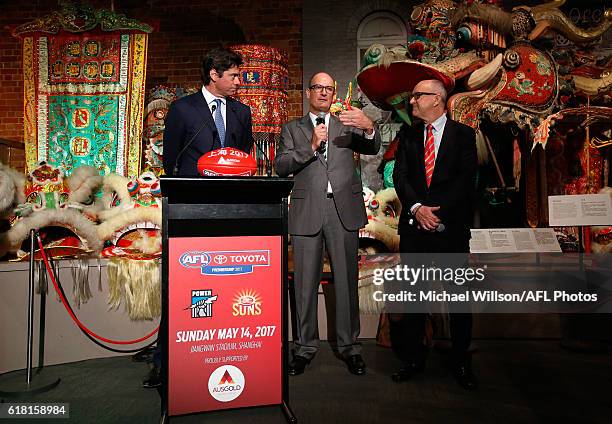 Gillon McLachlan, Power President David Koch and Suns Chairman Tony Cochrane speak to the media during an AFL announcement at The Chinese Museum...