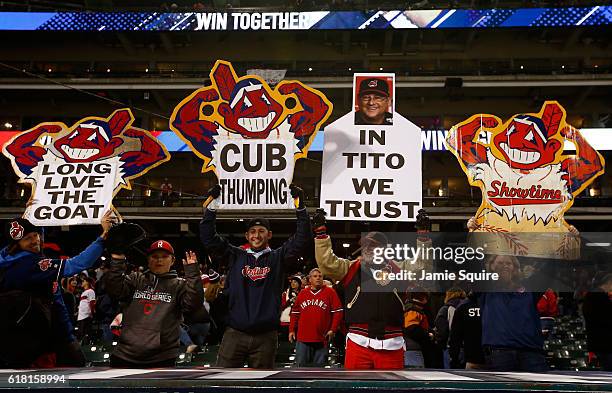 Cleveland Indians fans hold signs after the Cleveland Indians defeated the Chicago Cubs 6-0 in Game One of the 2016 World Series at Progressive Field...