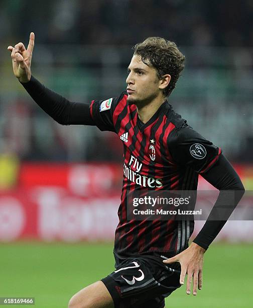 Manuel Locatelli of AC Milan celebrates after scoring the opening goal during the Serie A match between AC Milan and Juventus FC at Stadio Giuseppe...