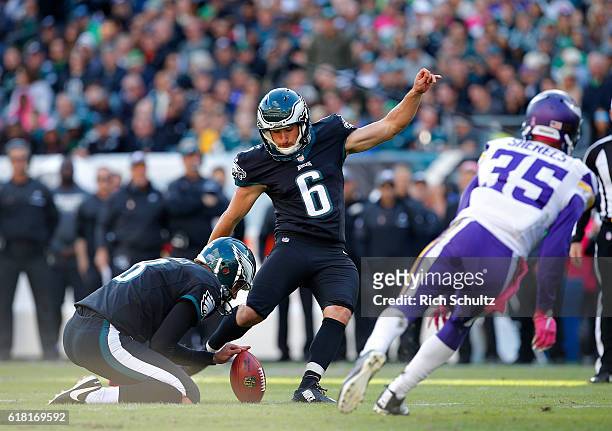 Caleb Sturgis of the Philadelphia Eagles kicks a field goal as Marcus Sherels of the Minnesota Vikings attempts a block during the fourth quarter of...