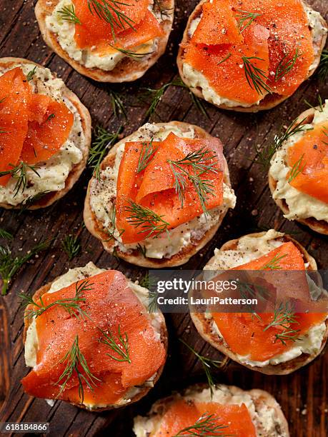 smoked salmon canapes with avocado cream cheese - smoked salmon stock pictures, royalty-free photos & images