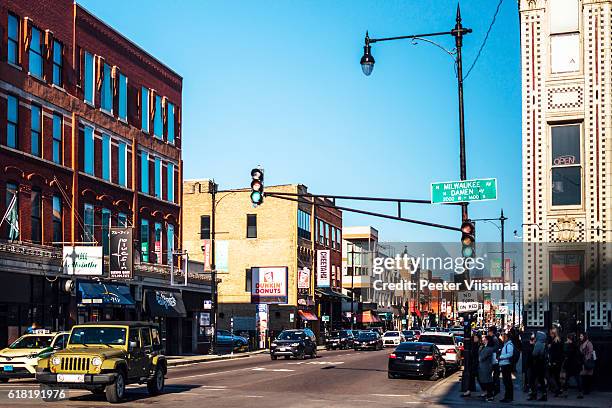 busy streets of chicago. wicker park. - traffic jam in chicago stock pictures, royalty-free photos & images