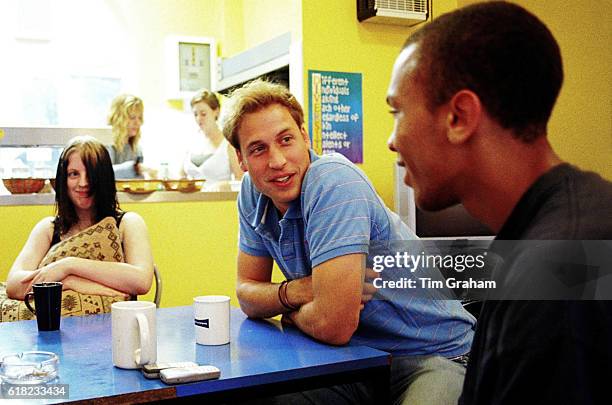 Prince William follows in his mother's footsteps as he speaks to young people during a volunteer visit to homeless charity Centrepoint of which the...