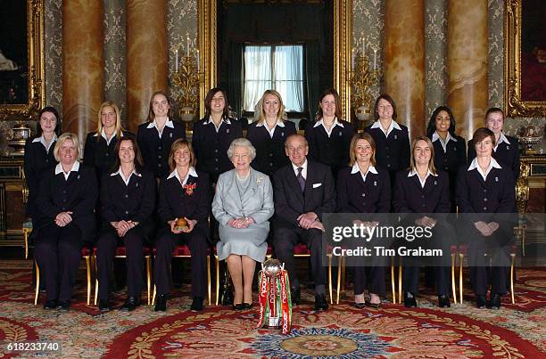 Queen Elizabeth II and Duke of Edinburgh with England's women's 2005 Ashes winning cricket team. Back from left: Jo Watts, Katherine Brunt, Beth...