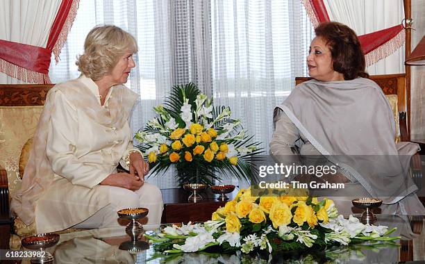 Camilla, Duchess of Cornwall sits with the President of Pakistan's wife, Sehba Musharraf at the President's Palace.