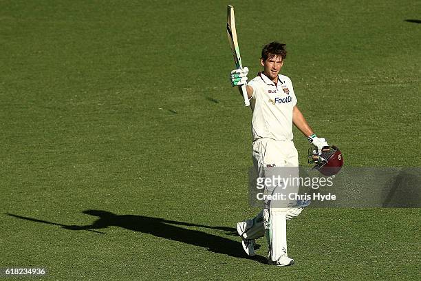 Joe Burns of the Bulls celebrates his century during day two of the Sheffield Shield match between Queensland Bulls and New South Wales Blues at The...