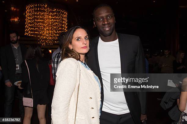 Actor Omar Sy and Helene Sy attend the after party for the screening of Sony Pictures Releasing's 'Inferno' at DGA Theater on October 25, 2016 in Los...
