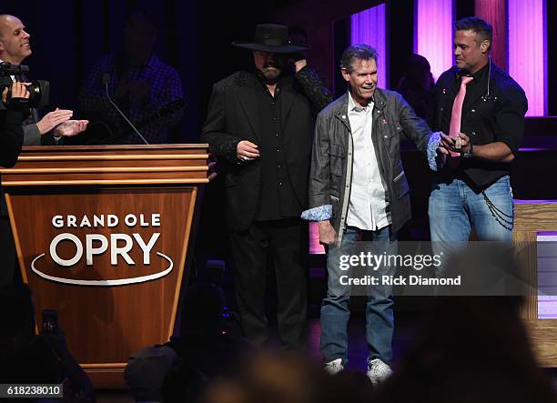 Eddie Stubbs introduces Eddie Montgomery and Troy Gentry who escort Singer/Songwriter Randy Travis on stage at Jason Aldean's 11th Annual Event...