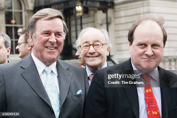 Radio presenters Terry Wogan, David Jacobs and James Naughtie await the arrival of Queen Elizabeth II outside BBC Broadcasting House to mark the 80th...