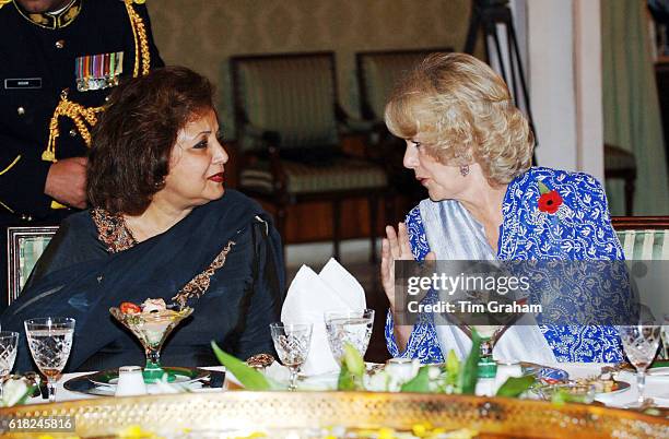 Camilla, Duchess of Cornwall talks with the Pakistani President's wife, Sehba Musharraf at a Presidential banquet at the President's Palace in...