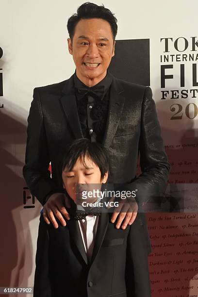 Singer and actor Francis Ng and his son arrive at the red carpet of opening ceremony of the Tokyo International Film Festival 2016 at Roppongi Hills...