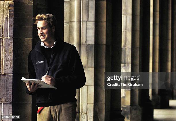 Prince William pauses in St Salvator's Quad at St Andrews University where he is a student. The Prince is in the last year of his four-year course at...