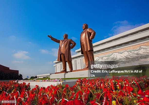 The two statues of the dear leaders in grand monument of mansu hill, pyongyang, North Korea on September 9, 2012 in Pyongyang, North Korea.