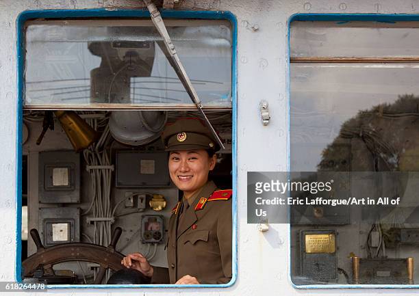 North korean guide inside uss pueblo spy boat, pyongyang, North Korea on September 9, 2012 in Pyongyang, North Korea.