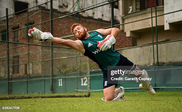 Jonathan Bairstow of England takes part in a wicketkeeping drill during a nets session at Sher-e-Bangla National Cricket Stadium on October 26, 2016...