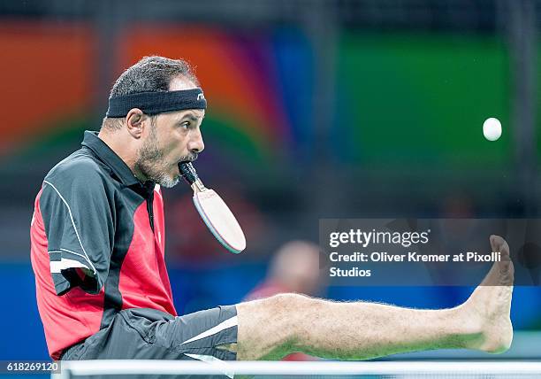 Ibrahim Hamadtou serving against Thomas Rau of RBS Solingen/Nordrhein-Westfalen [paralympic classification: WK6] on Day 2 of the Rio 2016 Paralympic...