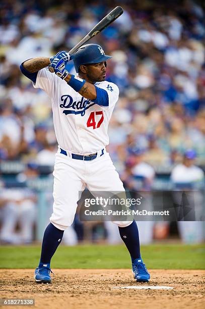 Howie Kendrick of the Los Angeles Dodgers bats against the Washington Nationals during the seventh inning in game three of the National League...