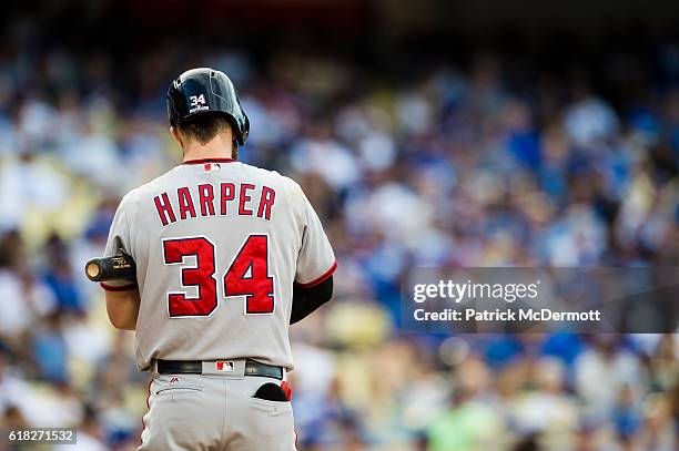 Bryce Harper of the Washington Nationals bats against the Los Angeles Dodgers during the ninth inning in game three of the National League Division...