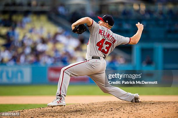 Mark Melancon of the Washington Nationals throws a pitch to a Los Angeles Dodgers batter during the ninth inning in game three of the National League...