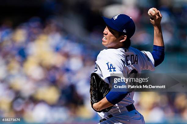 Starting pitcher Kenta Maeda of the Los Angeles Dodgers throws a pitch to a Washington Nationals batter during the first inning in game three of the...