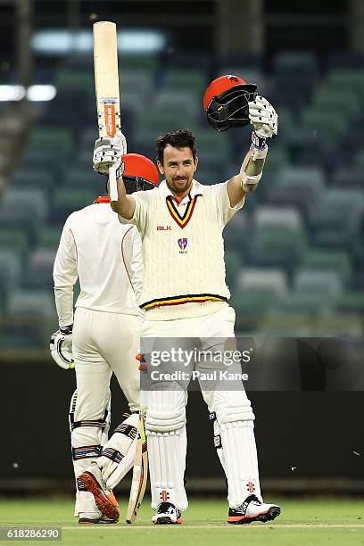 Tom Cooper of the Redbacks celebrates his century during day two of the Sheffield Shield match between Western Australia and South Australia at the...