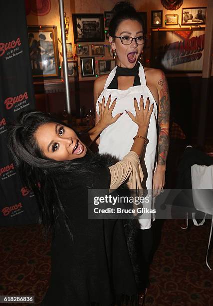 Snooki & JWoww pose as they celebrate the 50th show of the series "Snooki & JWoww: Moms With Attitude" at Buca di Beppo Times Square on October 25,...