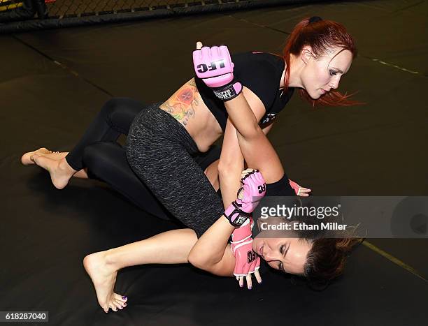 Fighters Jolene "The Valkyrie" Hexx and Allie "Babydoll" Parks train for the upcoming "Lingerie Fighting Championships 22: Costume Brawl I" at DXG...