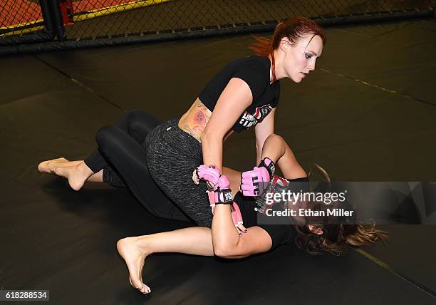 Fighters Jolene "The Valkyrie" Hexx and Allie "Babydoll" Parks train for the upcoming "Lingerie Fighting Championships 22: Costume Brawl I" at DXG...