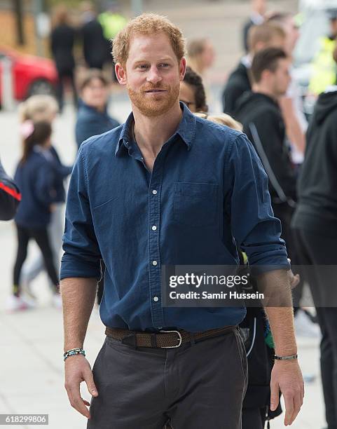 Prince Harry plays rugby with children as part of the Coach Core sporting apprenticeships at National Ice Centre on November 6, 2016 in Nottingham,...