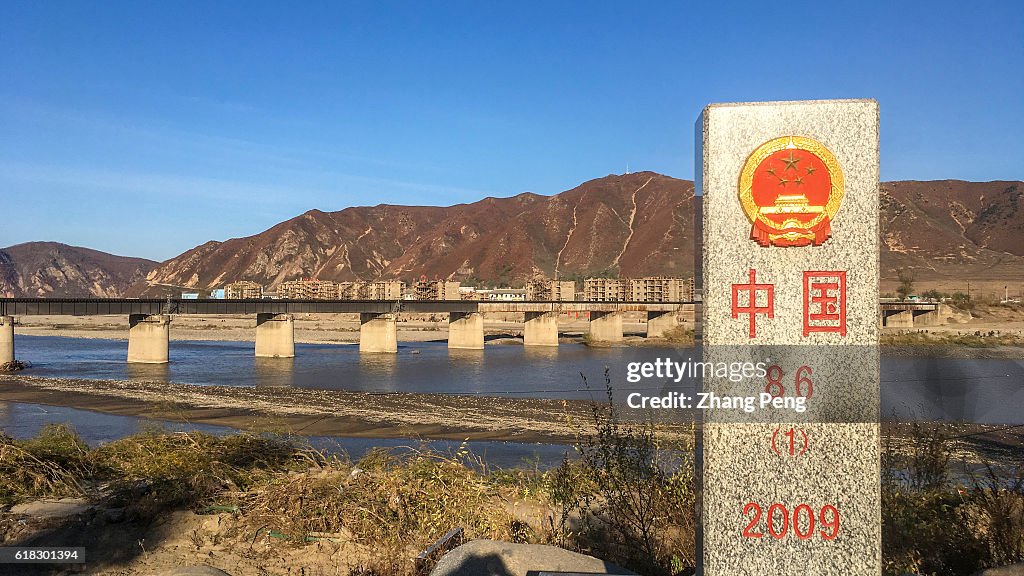 Stone boundary marker at China's side. The opposite over the...