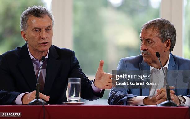 Mauricio Macri President of Argentina speaks as Juan Schiaretti Governor of Cordoba attends during a press conference to announce the return of...