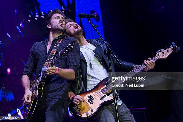 Andy Brown and Ryan Fletcher of Lawson perform at the Rays of Sunshine charity concert at Wembley Arena on October 24, 2016 in London, England