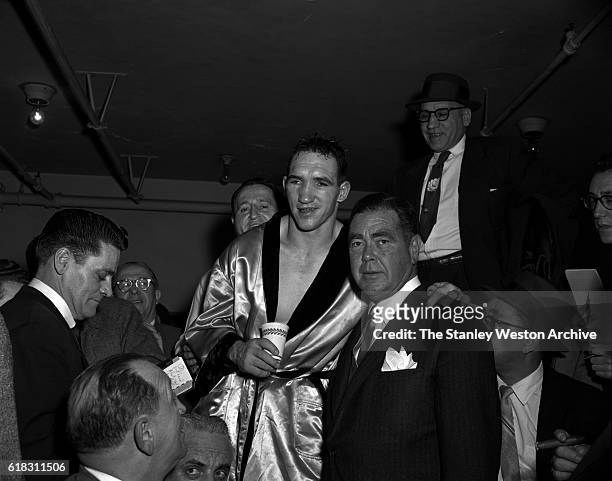 Gene Fullmer celebrates his win of the middleweight title verse Sugar Ray Robinson at Madison Square Garden, New York, New York on January 2, 1957.